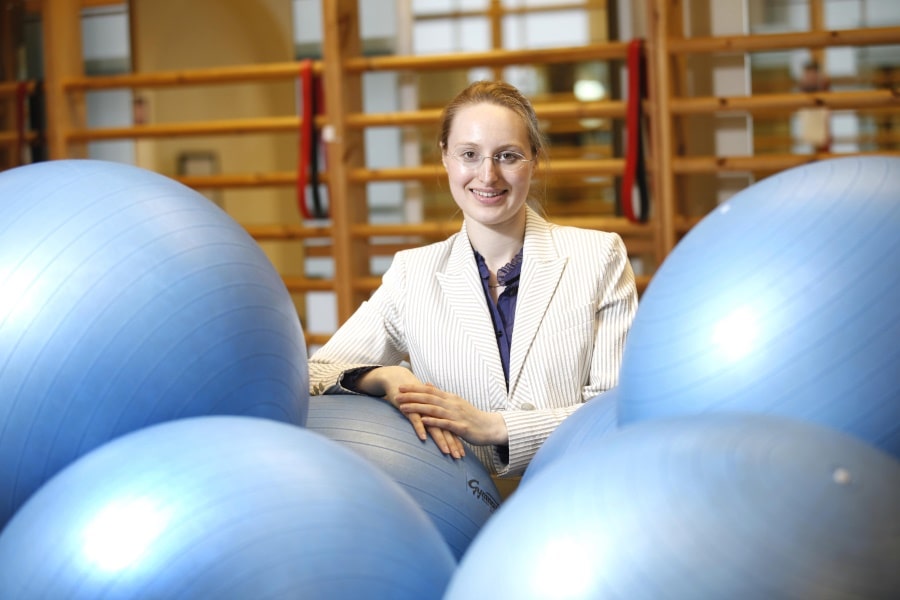 Scoliosis SOS founder Erika Maude with gym balls